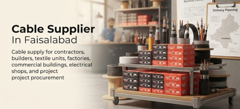 A display of various electrical cables and boxes stacked on a cart in a supply store, with text advertising a cable supplier in Faisalabad for contractors, builders, and commercial projects.